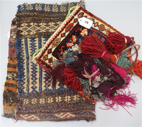 An Afghan saddle bag, a Turkish bag with woven and tasselled wool fringing and a Turkoman part bridal headdress